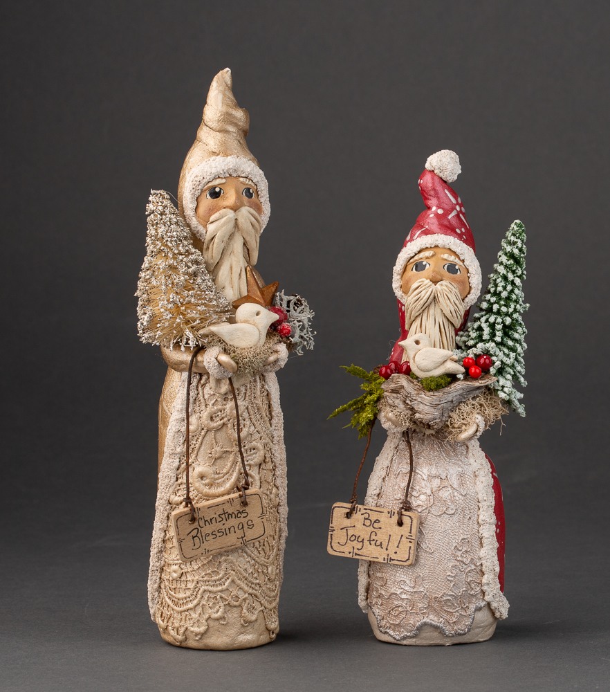 Two Old World Santa figurines made from bottles
